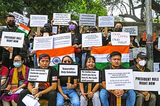Members of the Kuki tribe hold Indian Flags and Placards in a protest against the killings of tribals in the North Eastern state of Manipur, in New Delhi, India on May 31, 2023 Image:Â Kabir Jhangiani/NurPhoto via Getty Images