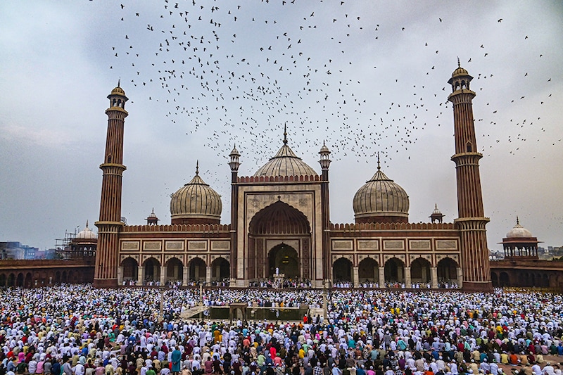 Muslim devotees offer Eid al-Adha prayers at Jama Masjid, at the old quarters of New Delhi, India, on June 29, 2023.