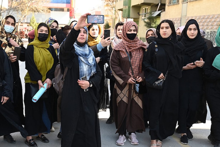 Afghan women stage a protest for their rights to mark International Women"s Day, in Kabul, Afghanistan on March 8, 2023. In recent months, the Taliban’s restrictions on the role of women in public life have tightened further. Women are banned from attending all universities and prevented from working for international organisations.