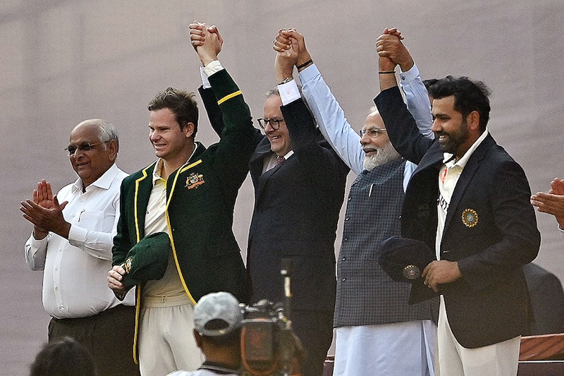 Indian Prime Minister Narendra Modi (2R) and Australia"s Prime Minister Anthony Albanese (C) pose for a picture with India"s captain Rohit Sharma (R) and Australia"s captain Steven Smith (2L) next to Gujarat Chief Minister Bhupendrabhai Patel (L) at the Narendra Modi stadium in Ahmedabad on March 9, 2023, before the start of the fourth and final Test cricket match between India and Australia.