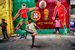 Children seen playing football in front of a graffiti wall with Cristiano Ronaldo (7) along the street as they celebrate FIFA World Cup 2022 in Kolkata.
Image: Avishek Das/SOPA Images/LightRocket via Getty Images