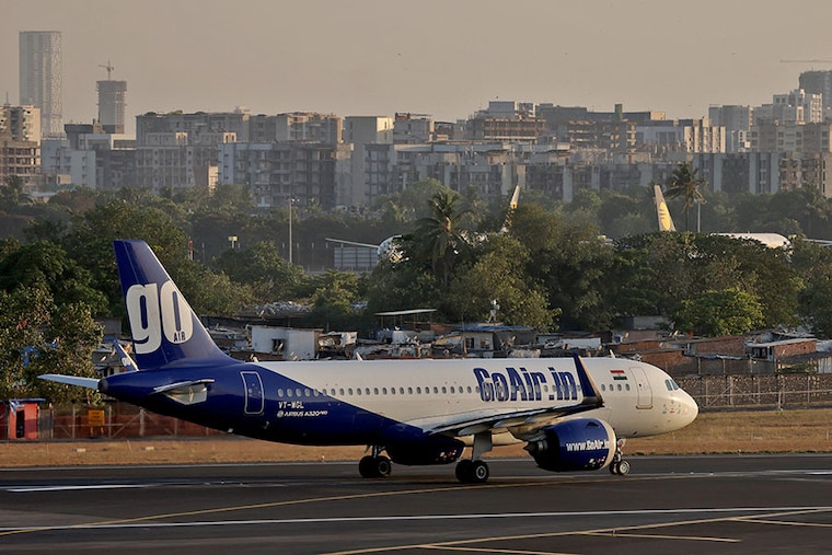 A Go First (formerly known as GoAir) Airbus A320 passenger aircraft taxies on the runway at Chhatrapati Shivaji International Airport in Mumbai, India, May 2, 2023. The low-cost carrier filed for bankruptcy, blaming US engine maker Pratt & Whitney for grounding half of its fleet. This is the third major airline to collapse since 2012 after Kingfisher and Jet.