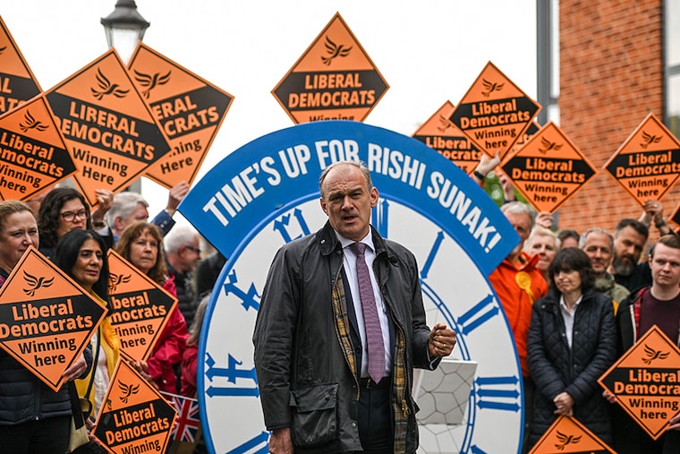Ed Davey, leader of the Liberal Democrat Party, celebrates with supporters on May 05, 2023, in Windsor, England. With 61 of the 230 councils counted and declared from Thursday"s local elections, the Liberal Democrats have won 315 seats, up 59. They have taken control of Windsor & Maidenhead and Brentwood councils and increased their majorities in Hull and Bath & North East Somerset.