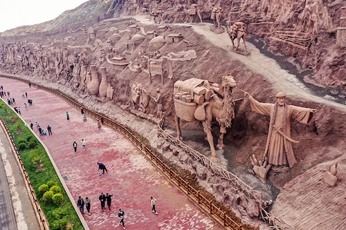 This photo taken on May 5, 2023, shows the relief of a large Cizhou kiln in the Fengfeng mining area of Handan City, North China"s Hebei Province. It is understood that the whole length of the mountain relief is nearly kilometres, and the average height is about 25 meters. More than 20 pictures are created in Cizhou Kiln, the market style of Pengcheng Ancient Town, the porcelain capital of thousands of years, the 72 processes of Cizhou kiln, and so on, showing the long history of Cizhou Kiln.