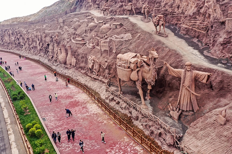 This photo taken on May 5, 2023, shows the relief of a large Cizhou kiln in the Fengfeng mining area of Handan City, North China"s Hebei Province. It is understood that the whole length of the mountain relief is nearly kilometres, and the average height is about 25 meters. More than 20 pictures are created in Cizhou Kiln, the market style of Pengcheng Ancient Town, the porcelain capital of thousands of years, the 72 processes of Cizhou kiln, and so on, showing the long history of Cizhou Kiln.