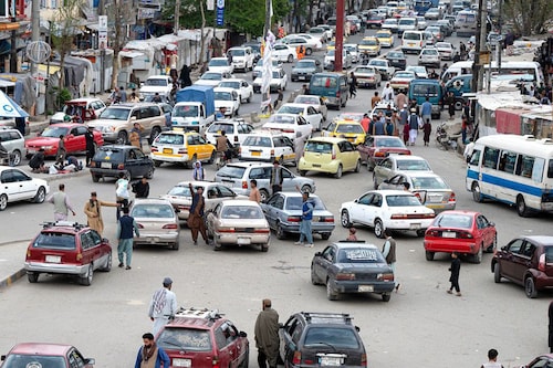 Sturdy, uncomplicated and affordable, the Toyota Corolla is a mainstay in a nation where roads dissolve into punishing terrain, repairs rely on frayed supply chains, and a "make do" mentality has emerged from decades of hardship. Image: Photography WAKIL KOHSAR / AFP