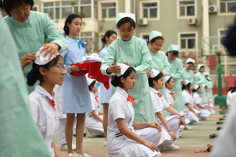 Nursing students attend a capping ceremony to mark International Nurses Day at Taiyuan Health School one day before on May 11, 2023, in Taiyuan, Shanxi Province of China. International Nurses Day is observed annually on May 12.