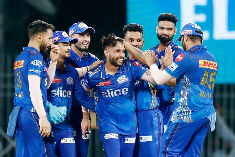 Akash Madhwal of Mumbai Indians celebrates with teammates after bowling out Mohsin Khan of Lucknow Super Giants (not pictured) during the IPL Eliminator match between Lucknow Super Giants and Mumbai Indians at MA Chidambaram Stadium on May 24, 2023, in Chennai, India. Akash’s five-wicket haul helped Mumbai Indians to register a big win over Lucknow Super Giants in the IPL 2023 eliminator.