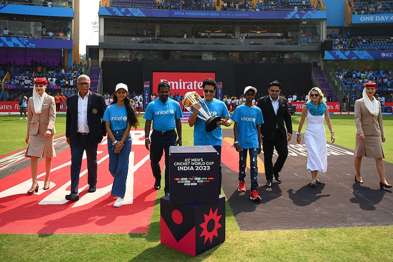 Sachin Tendulkar carries the ICC Men"s Cricket World Cup Trophy alongside Muttiah Muralitharan, Jay Shah, BCCI Honorary Secretary, Roger Binny, BCCI President and Cynthia McCaffrey, representative of UNICEF India ahead of the ICC Men"s Cricket World Cup India 2023 between India and Sri Lanka at Wankhede Stadium on November 02, 2023, in Mumbai, India.