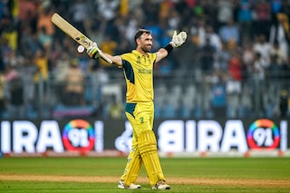 Australia"s Glenn Maxwell celebrates after winning the 2023 ICC Men"s Cricket World Cup one-day international (ODI) match between Australia and Afghanistan at the Wankhede Stadium in Mumbai on November 7, 2023. 
Image: Indranil Mukherjee / AFP
