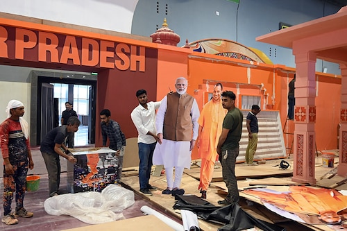 Cutouts of Prime Minister Narendra Modi and Chief Minister Yogi Adityanath at the Uttar Pradesh pavilion as the final touches are being given during preparations for the 42nd International Trade Fair at Pragati Maidan on November 13, 2023, in New Delhi, India.