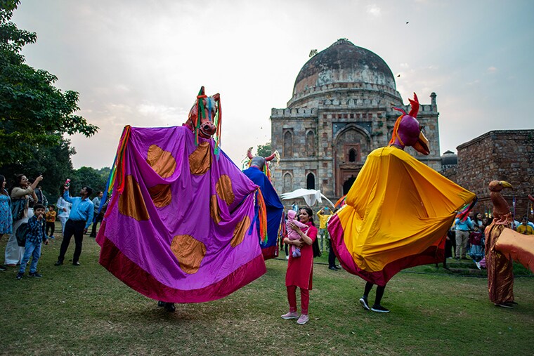 A giant puppet parade passes in front of Shish Gumbad in Lodhi Garden which marks the beginning of RISE 2023 at Alliance Franà§aise de Delhi. RISE 2023 stands for RE-Imagining School Education and is an initiative started by Alliance Franà§aise de Delhi, an Indo-French Cultural Centre specialising in French language teaching and organising cultural events.
