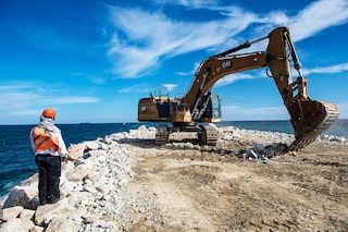 A worker supervises construction work of a wave breaker in the port of Salina Cruz, Oaxaca, Mexico.
Image: Claudio Cruz / AFP