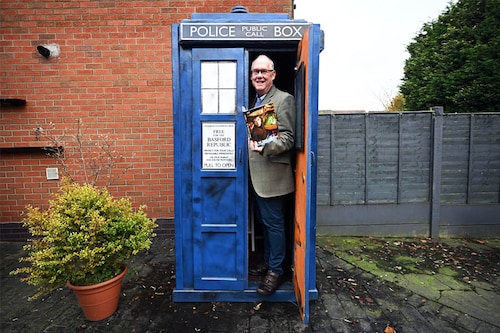 Dr Who fan Tony Jordan poses for a photograph with his TARDIS in the garden of his home in Cannock, central England. Image: Paul Ellis / AFP© Dr Who fan Tony Jordan poses for a photograph with his TARDIS in the garden of his home in Cannock, central England. Image: Paul Ellis / AFP©
