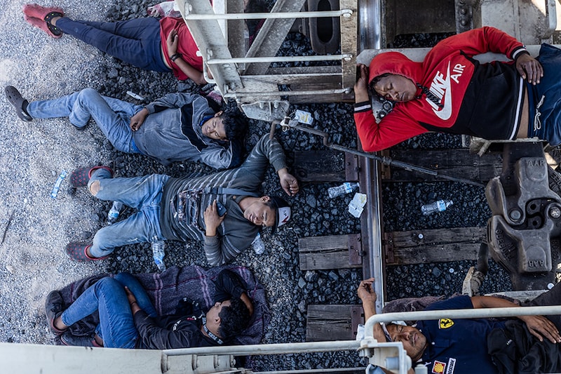 People arrive at the border city by freight train, in Ciudad Juarez, Mexico on September 29, 2023. Approximately 1,500 migrants arrived in Ciudad Juarez on a freight train, aiming to seek humanitarian asylum by surrendering to the Border Patrol of the United States. Unfortunately, these migrants were left stranded under the scorching sun without access to water or food for over 6 hours. These extreme conditions underscore the challenging adversity they face as they seek to reach the border to seek asylum.