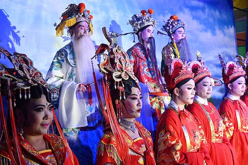 Members of the Jing Sheng Opera onstage during the first day of the Hakka Festival at the Yimin temple in Taoyuan
Image: Sam Yeh / AFPÂ©