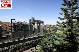 A view of the Ambuja Cements Limited plant earlier owned by Holcim and now owned by Adani Group is seen from a nearby village in Darlaghat, Solan district in the state of Himachal Pradesh, India.
Image: Reuters/Anushree Fadnavis