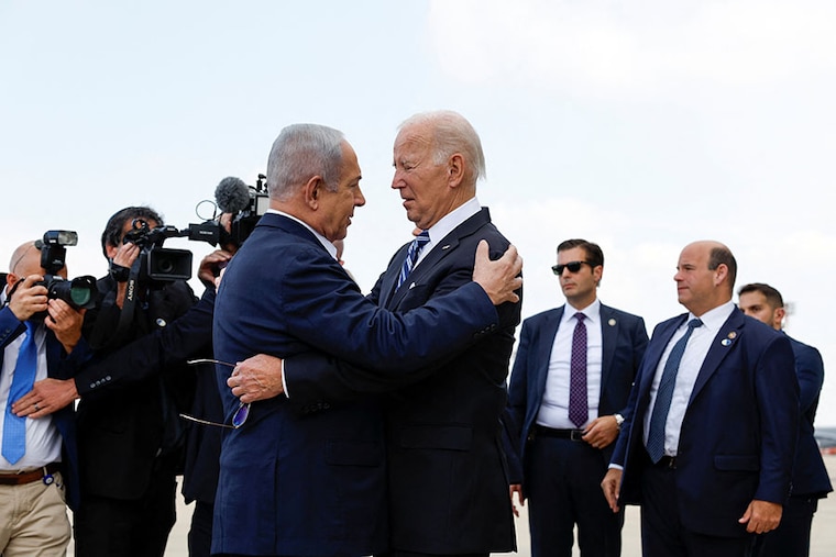 U.S. President Joe Biden is welcomed by Israeli Prime Minster Benjamin Netanyahu, as he visits Israel amid the ongoing conflict between Israel and Palestine, in Tel Aviv, Israel, October 18, 2023.