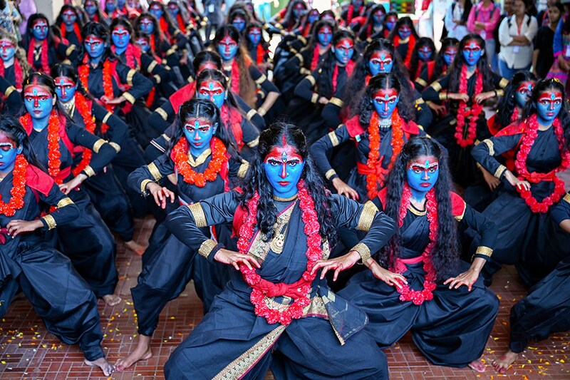 Students dressed as Goddess Kali perform a dance to celebrate the upcoming "Krishna Janmashtami" festival at a college in Mumbai on September 4, 2023.