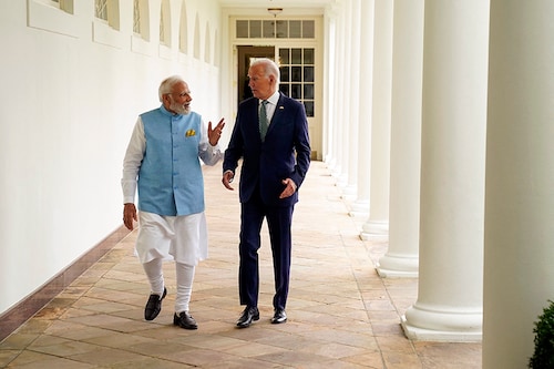 (File photo) US President Joe Biden and India"s Prime Minister Narendra Modi walk through the Colonnade to the Oval Office of the White House in Washington, DC, on June 22, 2023. Image: Evan Vucci / POOL / AFP (File photo) US President Joe Biden and India"s Prime Minister Narendra Modi walk through the Colonnade to the Oval Office of the White House in Washington, DC, on June 22, 2023. Image: Evan Vucci / POOL / AFP