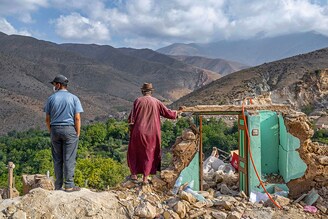 Displaced residents await updates about their relatives during ongoing rescue operations in the village of Imi N"Tala, near Amizmiz, in Morocco on September 12, 2023, four days after the deadly 6.8-magnitude earthquake. Hopes dimmed in Morocco"s search for survivors four days after a powerful earthquake killed more than 2,900 people, most of them in remote villages of the High Atlas Mountains.