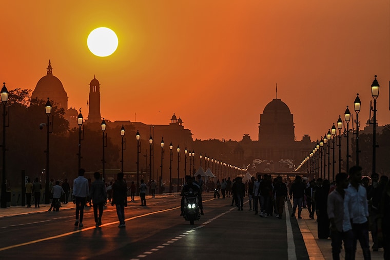 Visitors seen at Kartvya Path during the beautiful sunset on September 20, 2023, in New Delhi, India.