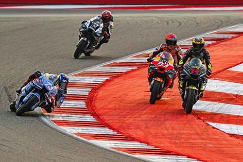 Gresini Racing MotoGP"s Spanish rider Alex Marquez (L), Repsol Honda Team"s German rider Stefan Bradl (top), Repsol Honda"s Spanish rider Marc Marquez (2R) and Mooney VR46 Racing Team"s Italian rider Marco Bezzecchi steer their bikes during a practice session ahead of the Indian MotoGP Grand Prix at the Buddh International Circuit in Greater Noida on the outskirts of New Delhi, on September 22, 2023.