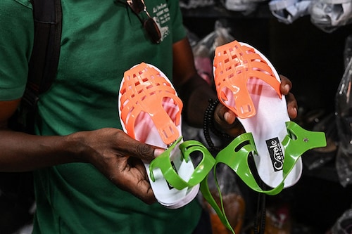 Leke sandals have been sold in Ivorian markets "for 30 or 40 years" and not even the worldwide success of flip-flops has usurped what has become a symbol of Ivorian identity. Image: Sia Kambou / AFP© Leke sandals have been sold in Ivorian markets "for 30 or 40 years" and not even the worldwide success of flip-flops has usurped what has become a symbol of Ivorian identity. Image: Sia Kambou / AFP©