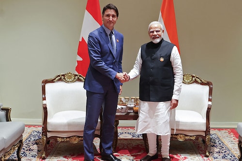 India"s Prime Minister Narendra Modi (R) and his Canada counterpart Justin Trudeau shake hands during a bilateral meeting after the G20 Summit in New Delhi on September 10, 2023. Image: PIB / AFP