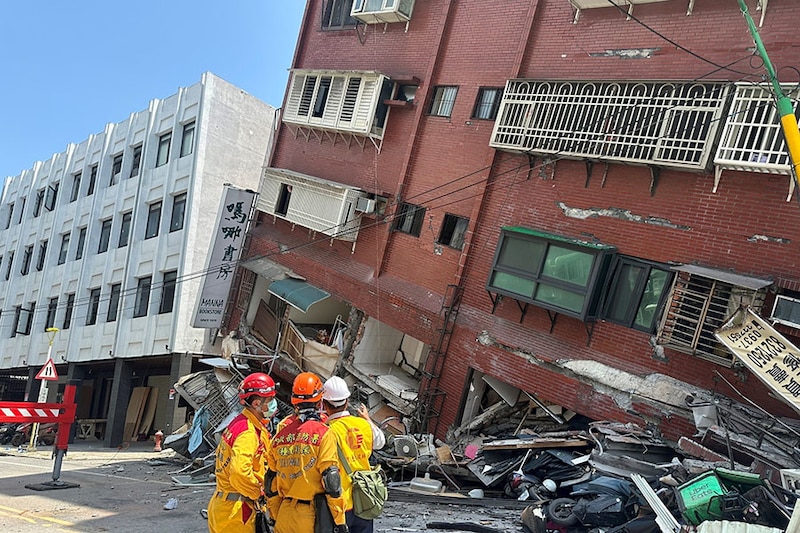 In this handout provided by Taiwan"s National Fire Agency on April 3, 2024, firefighters work at the site where a building collapsed following the earthquake in Hualien, Taiwan.