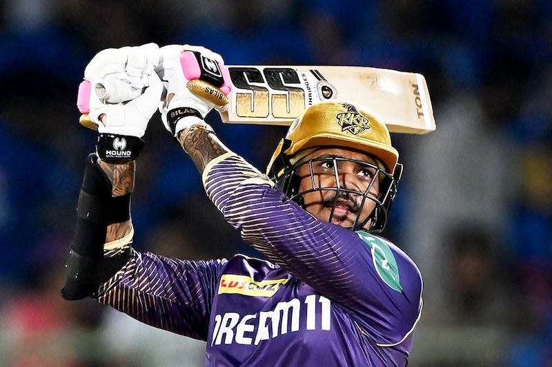 Kolkata Knight Riders" (KKR) Sunil Narine plays a shot during the Indian Premier League (IPL) Twenty20 cricket match against Delhi Capitals at the YSR Reddy cricket stadium in Visakhapatnam on April 3, 2024. Demolishing the Delhi Capitals" (DC) world-class bowling attack, power-hitter Sunil Narine scored a 21-ball half-century, notching up his career-best score of 85 off 39 balls. KKR recorded a massive 106-run win over DC.