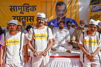 AAP party workers dressed in "Main Bhi Kejriwal"" outfits held a one-day hunger strike to mark their protest against the arrest of Delhi CM Arvind Kejriwal at Azad Maidan on April 7, 2024, in Mumbai, India. The Aam Aadmi Party (AAP) observed a day-long "Samuhik Upwas", or "mass fast" on Sunday to protest against the arrest of Delhi Chief Minister and the party"s national convener Arvind Kejriwal by the Enforcement Directorate last month in connection to the liquor policy case.