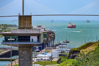 A cargo ship passes through the Panama Canal"s Agua Clara locks on Gatun Lake in Colon, Panama, on April 14, 2024. The number of ships allowed through the drought-hit Panama Canal each day will be increased thanks to signs of an improvement in water levels, authorities said on April 15, 2024. 
Image: Martin Bernetti / AFP