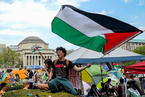 Protestors wave Palestinian flags on the West Lawn of Columbia University on April 29, 2024, in New York. Student demonstrators at Columbia University, the epicentre of pro-Palestinian protests that have erupted at US colleges, said Monday they would not budge until the school met their demands, defying an ultimatum to disperse or face suspension.