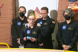 In this still image taken from a July 6, 2024, NASA TV broadcast, volunteer crew commander Kelly Haston speaks alongside crewmates (L-R) Ross Brockwell, Nathan Jones and Anca Selariu, as they exit the first simulated yearlong Mars habitat mission at Johnson Space Center in Houston, Texas. - The crew"s mission began in the 3D printed Mars habitat on June 25, 2023. Image: Jose Romero / NASA TV / AFP)