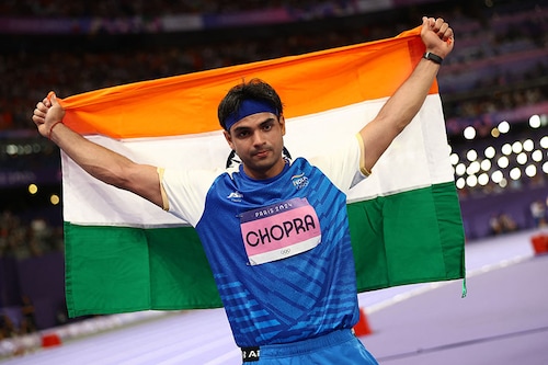 India"s star javelin thrower, Neeraj Chopra, posed with the Indian flag after clinching a silver medal at the Paris Olympics with a throw of 89.45m. This is India"s first silver this season. Pakistan"s Arshad Nadeem won the gold after setting a new Olympic record with a throw of of 92.97m.