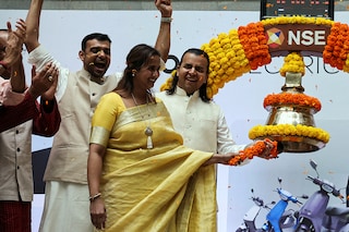 Bhavish Aggarwal, CEO of Ola Cabs and founder of Ola Electric and his wife, Rajalakshmi Aggarwal ring the bell during Ola Electric"s listing ceremony at the National Stock Exchange (NSE) in Mumbai, India, August 9, 2024.
Image: Francis Mascarenhas / Reuters