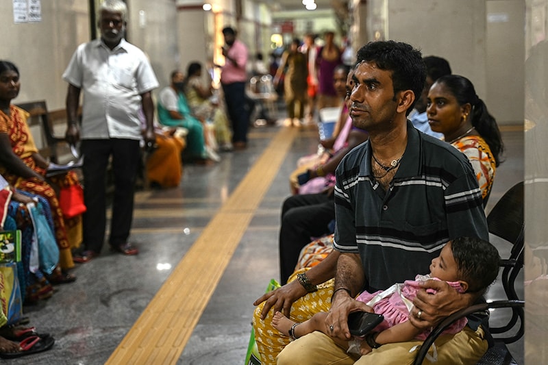 People wait for their turn at a government hospital in Chennai during doctors" nationwide strike on August 17, 2024. Indian doctors launched a nationwide strike escalating protests after the barbaric rape and murder of their colleague that has channelled outrage at the chronic issue of violence against women.