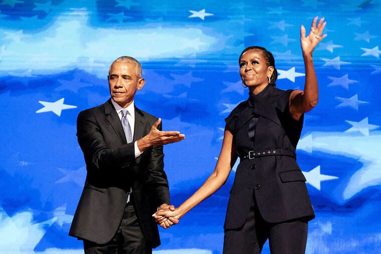 Former US first lady Michelle Obama greets her husband, former US President Barack Obama, on stage during Day 2 of the Democratic National Convention (DNC) in Chicago, Illinois, on August 20, 2024. Image: Reuters/Alyssa Pointer