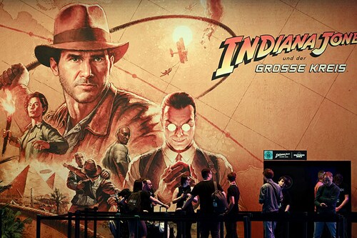Visitors stand at the booth of the video game "Indiana Jones and the Great Circle" during the media day at the Gamescom video games trade fair in Cologne.
Image: Ina Fassbender / AFPÂ©