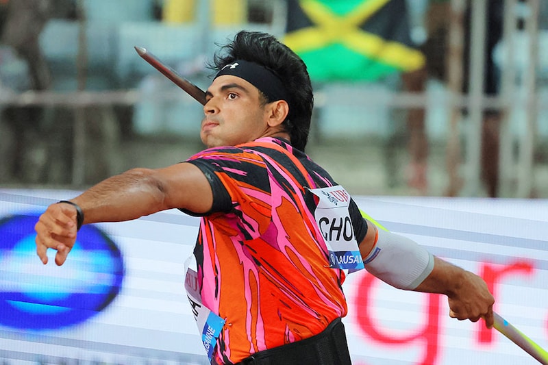 India"s Neeraj Chopra competes in the men"s javelin throw event at the "Athletissima" Diamond League athletics meeting in Lausanne on August 22, 2024. Despite battling injury concerns, Chopra made the final throw, which resulted in a season"s best effort of 89.49 metres, winning him second spot in the league.