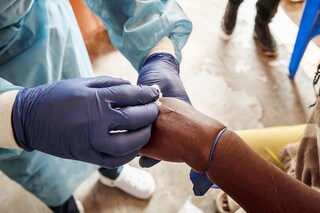 Vaccination combined with educating at-risk individuals and isolating contact cases, helped the world contain the 2022 mpox outbreak.
Image: Guerchom Ndebo / AFPÂ©