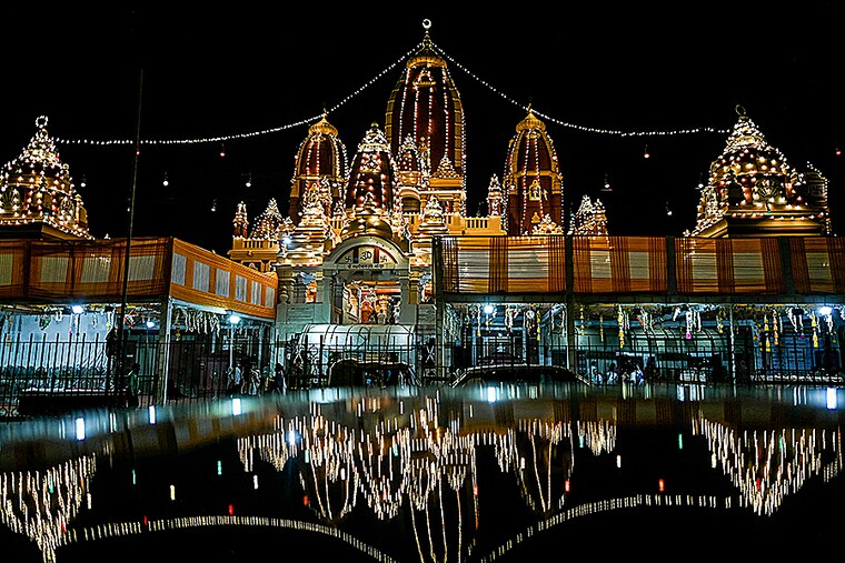 An illuminated exterior view of the Laxmi Narayan temple is pictured on the eve of ‘Janmashtami festival’ in New Delhi on August 25, 2024.