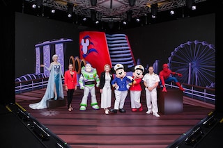 Sarah Fox, vice president and regional general manager, Asia, Disney Cruise Line (second from left), Laura Cabo, portfolio executive creative director, Walt Disney Imagineering (fourth from left) and Lee Hawkins, cruise director, Disney Cruise Line (second from right) with various characters from the Disney stable. Image: Courtesy Disney