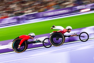 Marcel Hug of Team Switzerland and Brent Lakatos of Team Canada compete in the Men"s 5000m - T54 Round 1 Heat 1 on day two of the Paris 2024 Summer Paralympic Games at Stade de France on August 30, 2024 in Paris, France.