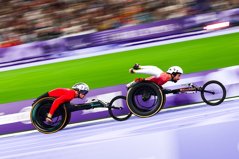 Marcel Hug of Team Switzerland and Brent Lakatos of Team Canada compete in the Men"s 5000m - T54 Round 1 Heat 1 on day two of the Paris 2024 Summer Paralympic Games at Stade de France on August 30, 2024 in Paris, France.