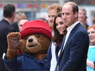 Britain"s Prince Harry (C), Britain"s Catherine, Duchess of Cambridge (2R) and Britain"s Prince William, Duke of Cambridge stand by a person in a Paddington Bear outfit in 2017
Image: Chris J Ratcliffe / AFP©