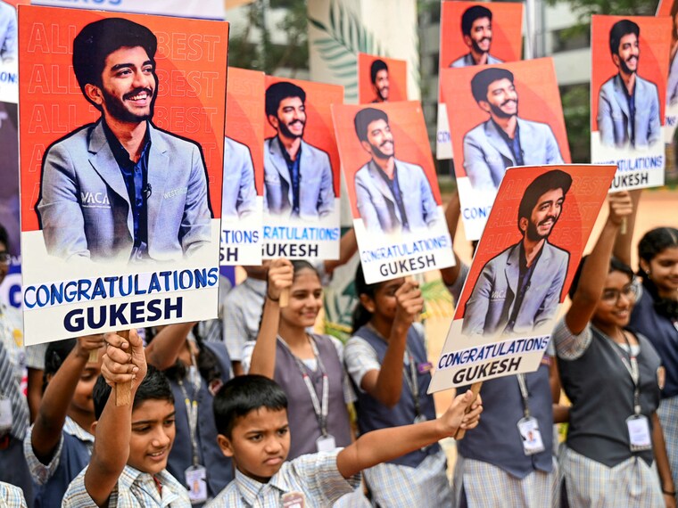 School students congratulate the world"s youngest chess champion Gukesh Dommaraju, in Chennai on December 13, 2024. Gukesh was seven when he watched Viswanathan Anand lose the world chess title in 2013 to challenger Magnus Carlsen of Norway—a match that fired up his dream to bring the crown back to India. Eleven years later, the 18-year-old beat China"s Ding Liren in a gruelling tournament to become the youngest world chess champion.