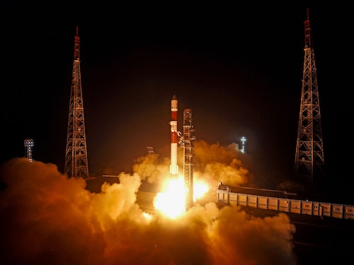 This handout photograph taken and released on December 30, 2024, by the Indian Space Research Organisation (ISRO) shows the launch of the ISRO PSLV-C60 rocket carrying two SpaDeX satellites SDX01 (Chaser) and SDX02 (Target) from the Satish Dhawan Space Centre in Sriharikota.