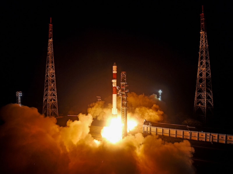 This handout photograph taken and released on December 30, 2024, by the Indian Space Research Organisation (ISRO) shows the launch of the ISRO PSLV-C60 rocket carrying two SpaDeX satellites SDX01 (Chaser) and SDX02 (Target) from the Satish Dhawan Space Centre in Sriharikota.